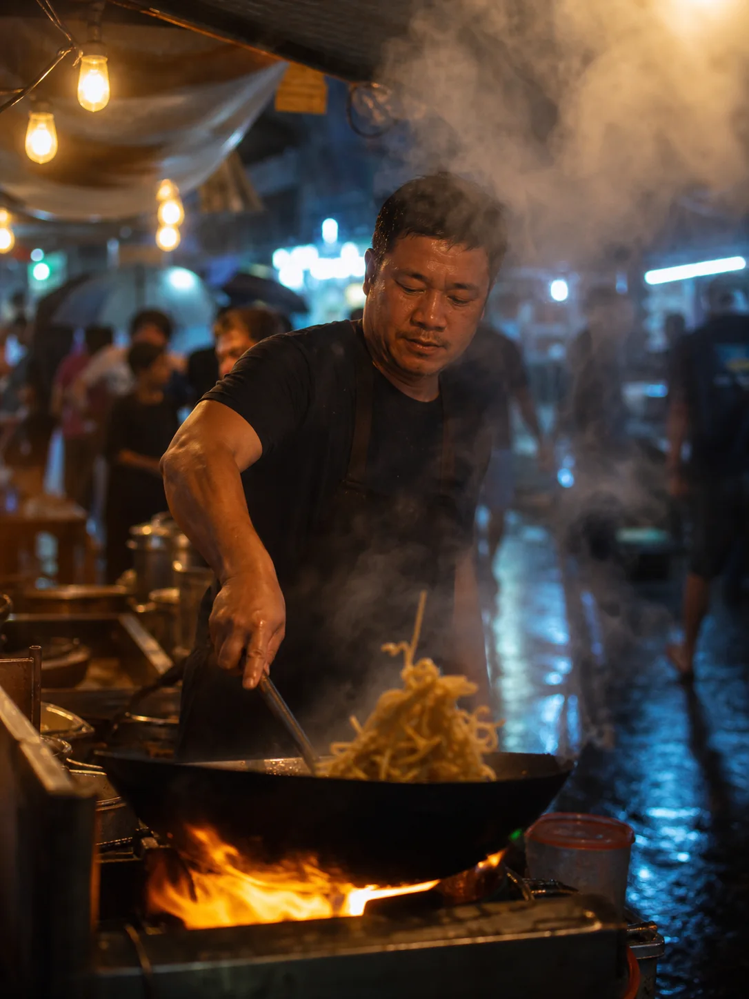 A chef cooking at a cinematic night market