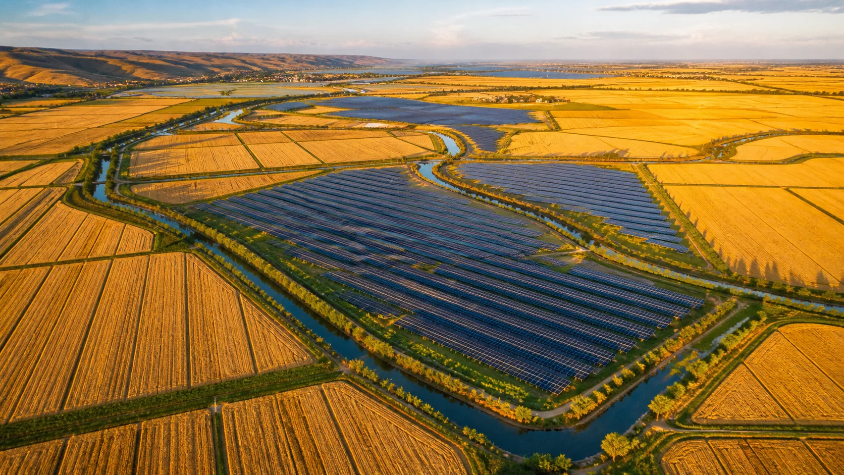 Solar panels woven through golden agricultural fields